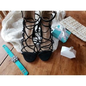 Black strappy high heels